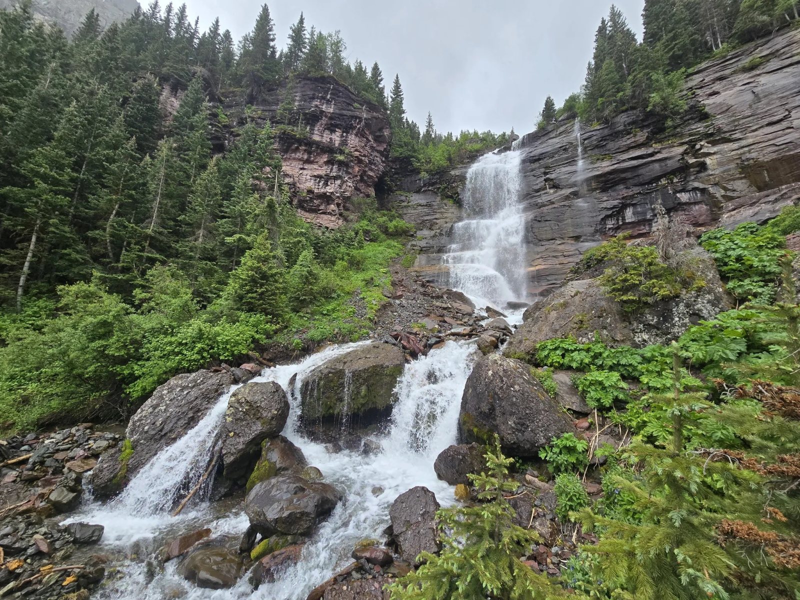 Bear Creek Falls tumbling down a rock face above Telluride